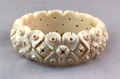 LG8 faux ivory highly carved bangle